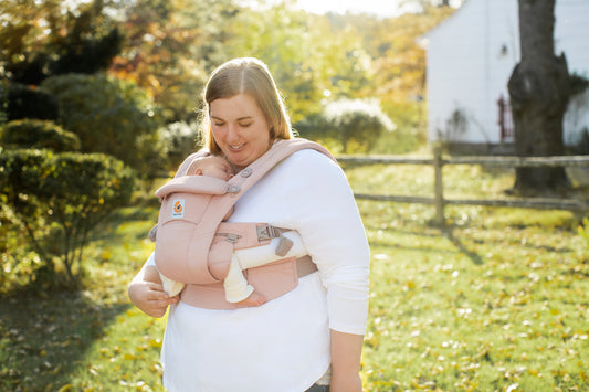 Postpartum healing and connection through babywearing